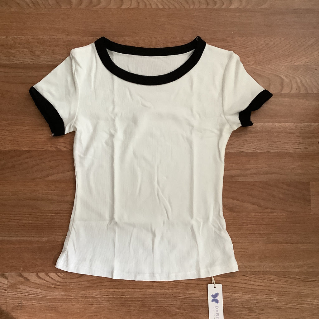 White and black womans shirt