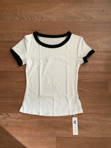 White and black womans shirt