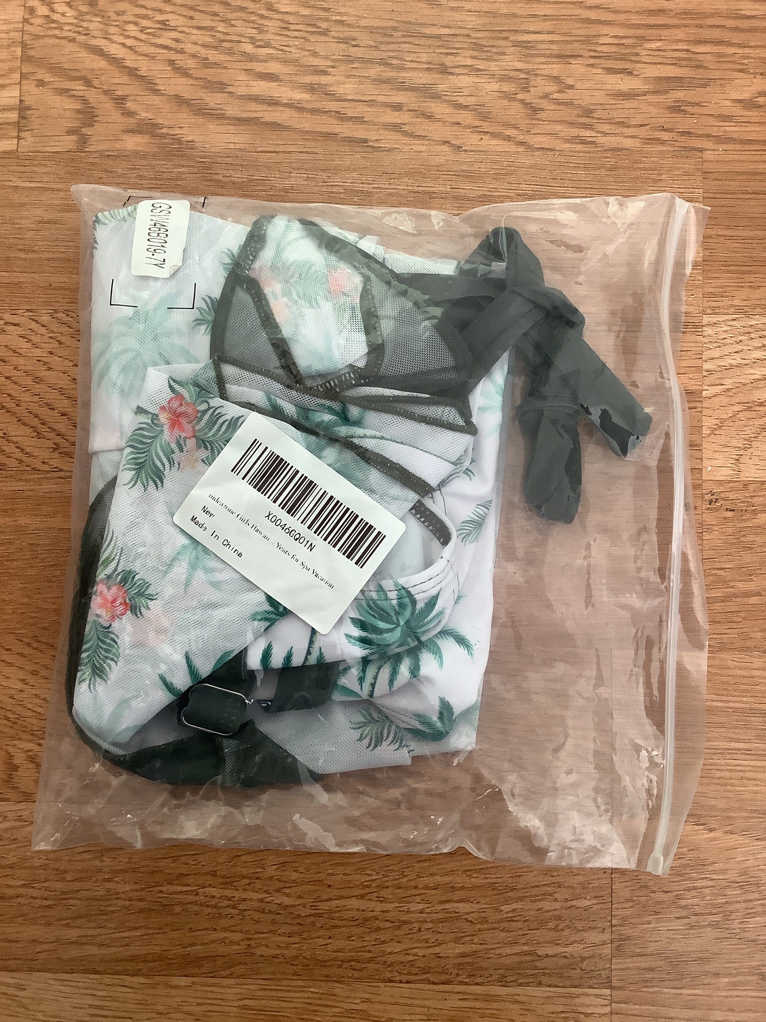 Youth size 7 girls swimsuit with little coverup